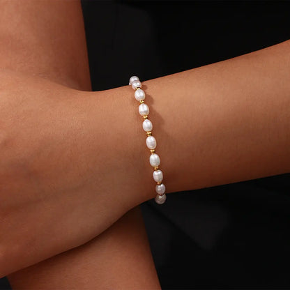 Elegant Perle og Guld Armbånd