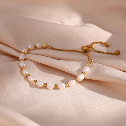 Elegant Perle og Guld Armbånd