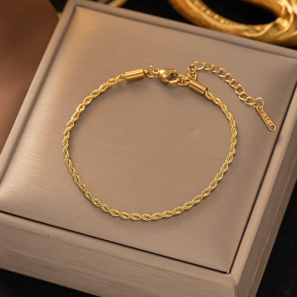 Snoet Lænkearmbånd | Guld
