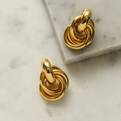 Statement Interlocking Øreringe | Guld