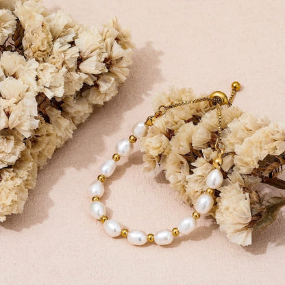 Elegant Perle og Guld Armbånd